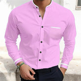 A simple, loose-fitting, single-breasted shirt with a stand-up collar that goes with everything in color