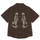 Куртаи остини кӯтоҳ дар беруни обногузар