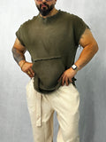 Green top with cap sleeves and pockets