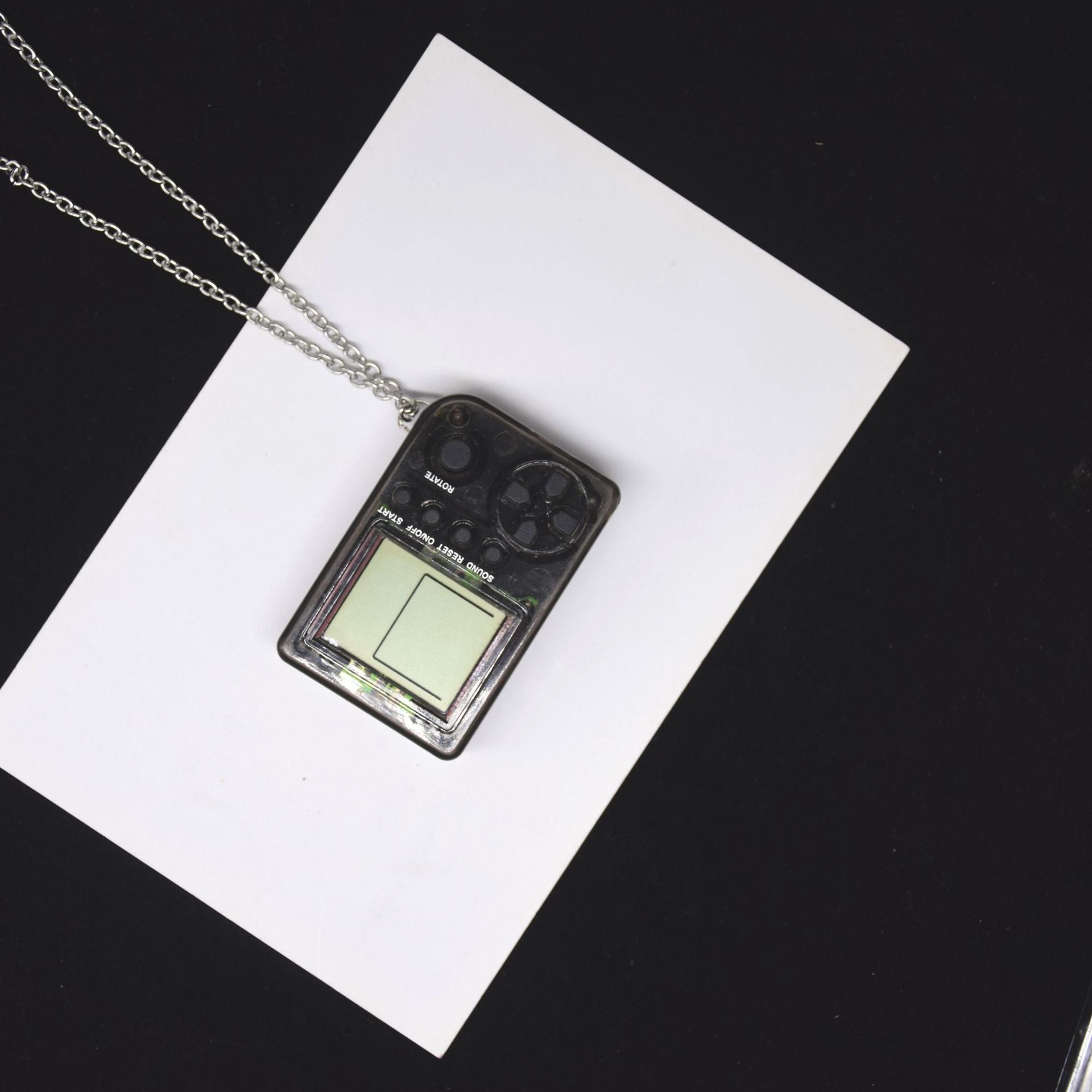 Retro game console necklace