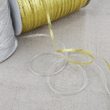 Gold And Silver Onion With Christmas Ribbon Gift Wrapping