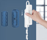 The socket holder is free of perforation and traceless wall-mounted