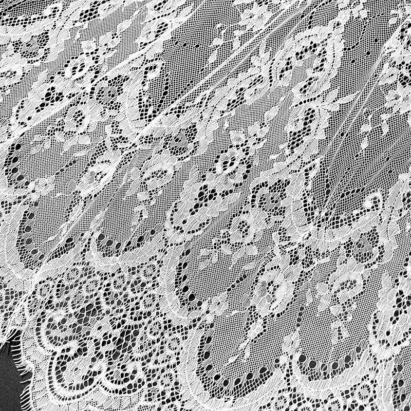 Available In Black And White With Lace Eyelash And Lace Fabric