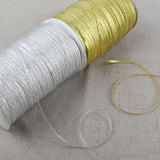 Gold And Silver Onion With Christmas Ribbon Gift Wrapping