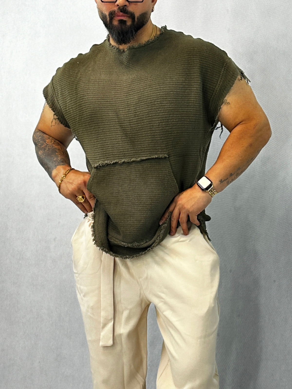 Green top with cap sleeves and pockets